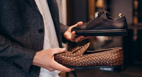 Holding woven loafers